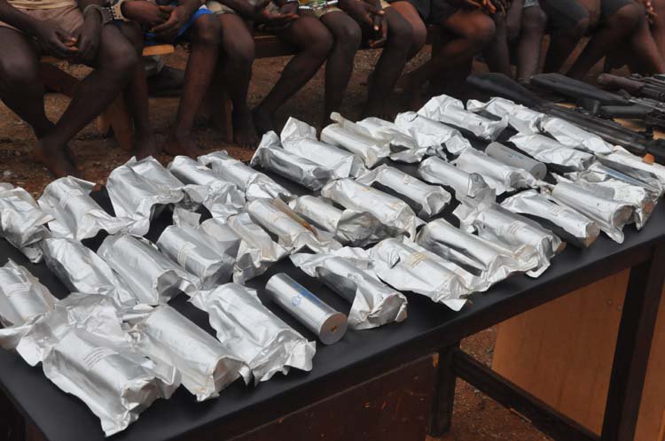 Smoke grenade canisters recovered from suspects