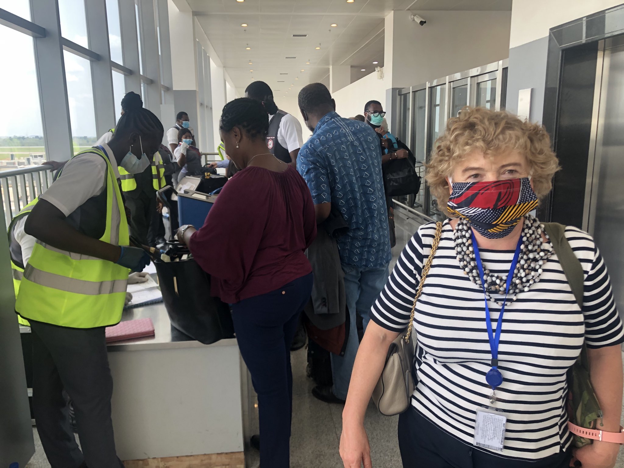 British High Commissioner to Nigeria putting on made in Nigeria Ankara mask