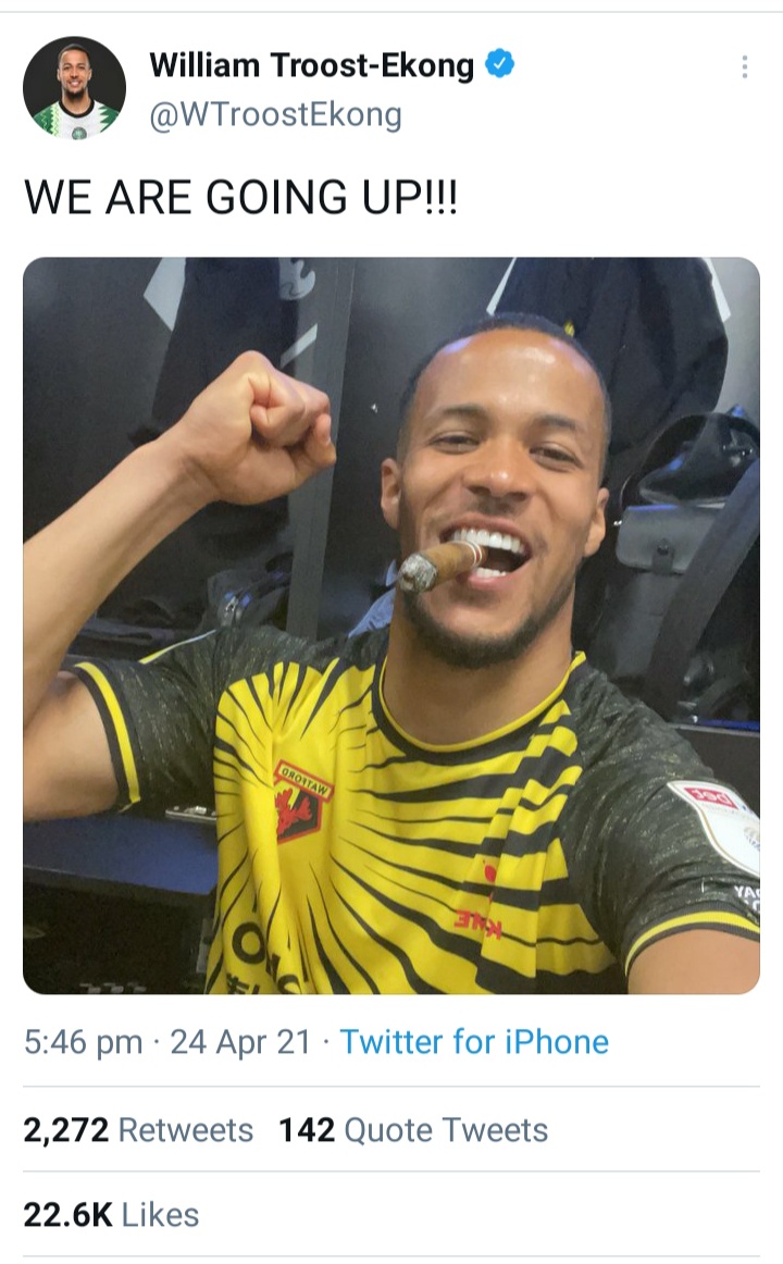 Pictured smoking cigar, Super Eagles player lands in hot water