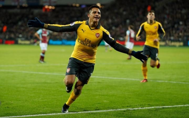 Sanchez scores superb hat-trick as Arsenal move to second place