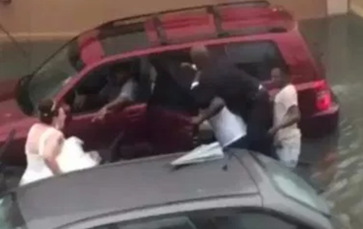 Trending: Photos of newly wedded couple stranded after flooding in Lagos