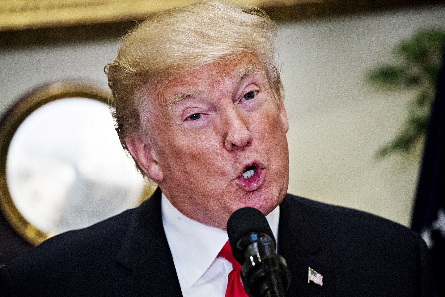 Trump unfolds tough immigration system