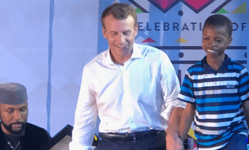 [Video] Macron stunned as 11-yr-old Nigerian artist, Kareem Olamilekan drew his portrait in two hours