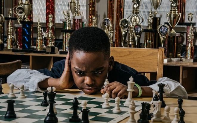 Clinton congratulates, invites 8-year-old Nigerian kid for winning Chess Championship