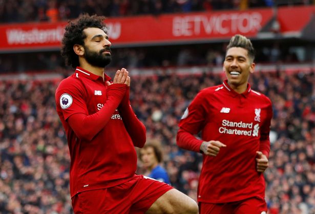 Liverpool stay top with club record-breaking win at Burnley