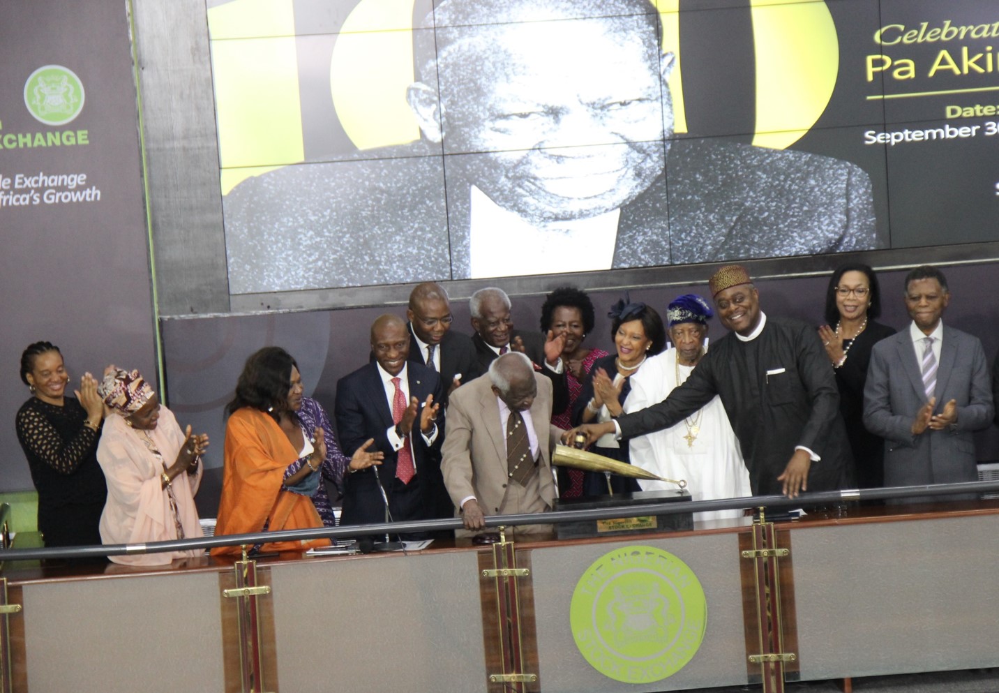 NSE celebrates Pa Akintola Williams at 100, beats closing gong