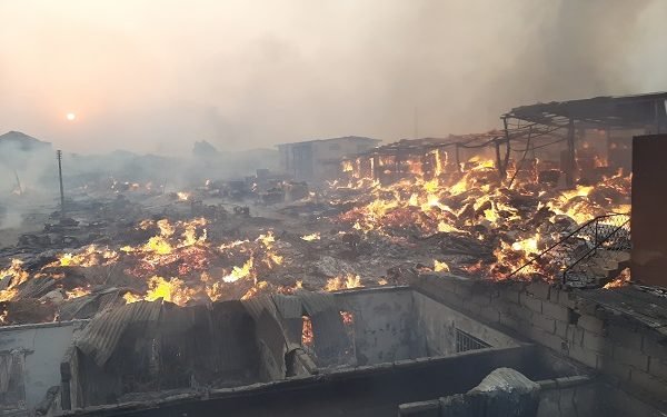 Many collapse as fire guts popular Lagos plank market