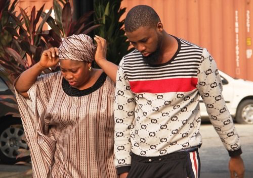 Photo: Court sentences mother, son to 12 years for duping American of $82,570