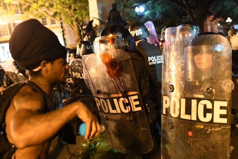 Unrest grips dozens of U.S. cities as Police, protesters clash