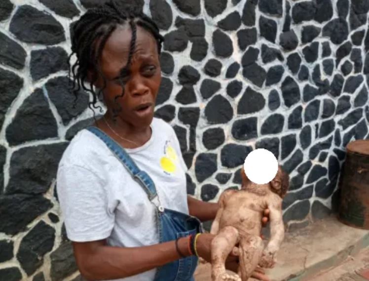 GRAPHIC PHOTO: Mother throws new born baby inside pit toilet