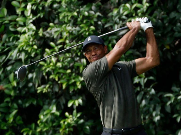 Tiger Woods makes hot start to Masters title defence, Casey leads