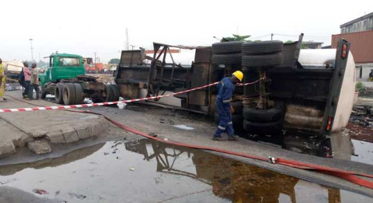 Driver absconds after petrol tanker falls, spills content on Lagos road