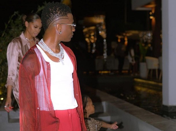 Wizkid hangs out with Jada Pollock, third son