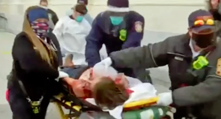 Trending video: Paramedics wheel woman shot in US Capitol as pro-Trump protesters seize US Congress