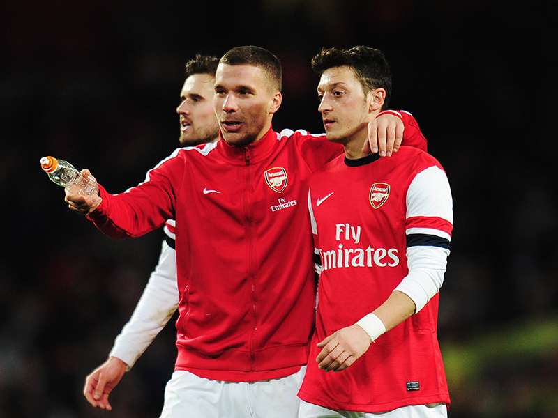 Podolski slams Arsenal over Ozil treatment