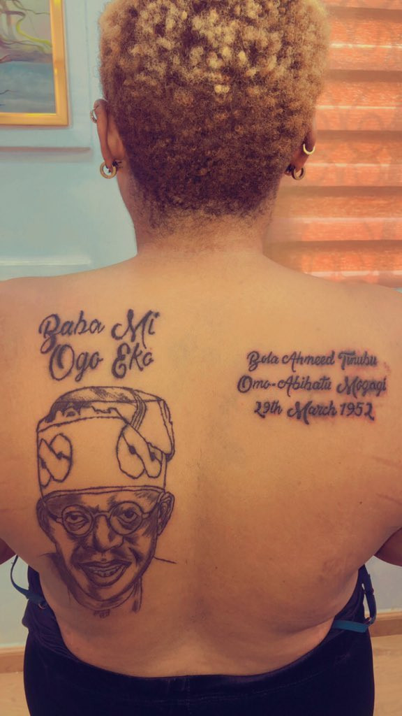Trending photos: Tinubu’s super female fan tattoos his face, bio on her back