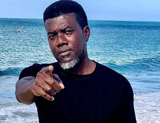 VIDEO: Jonathan’s ex-aide, Reno Omokri leads another #HarassBuhariOutofLondon protest at Abuja House