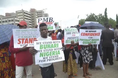 June 12: #IstandwithBuhari group fight dirty over money in Abuja