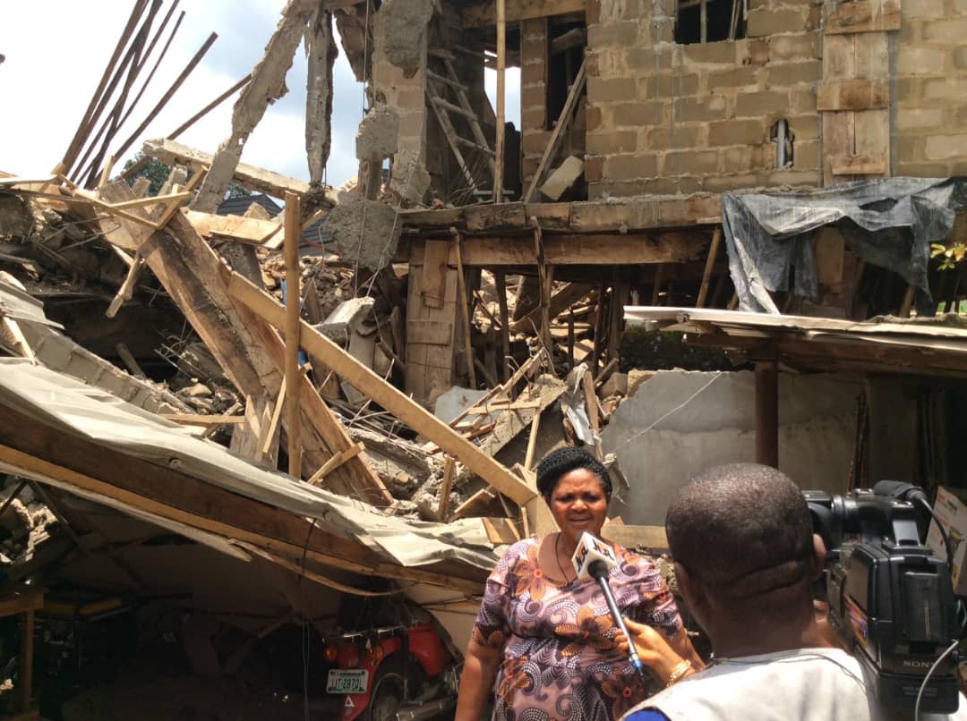 Photo: Housewife escapes death as two storey building under construction collapses into her compound in Nnewi