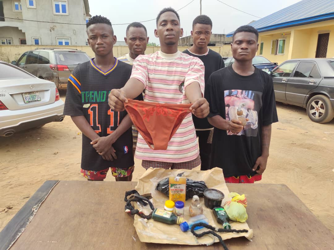 [Photo] Police arrest suspected cultists with female pant, charms in Delta