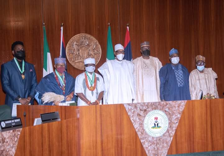 Buhari confers NNOM award on 3 scholars