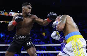 Oleksandr Usyk defeats Anthony Joshua to retain IBF, WBA and WBO heavyweight title 