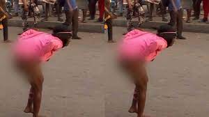 Lady runs mad after dropping from an SUV of a suspected Yahoo Boy