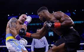 Oleksandr Usyk defeats Anthony Joshua to retain IBF, WBA and WBO heavyweight title 