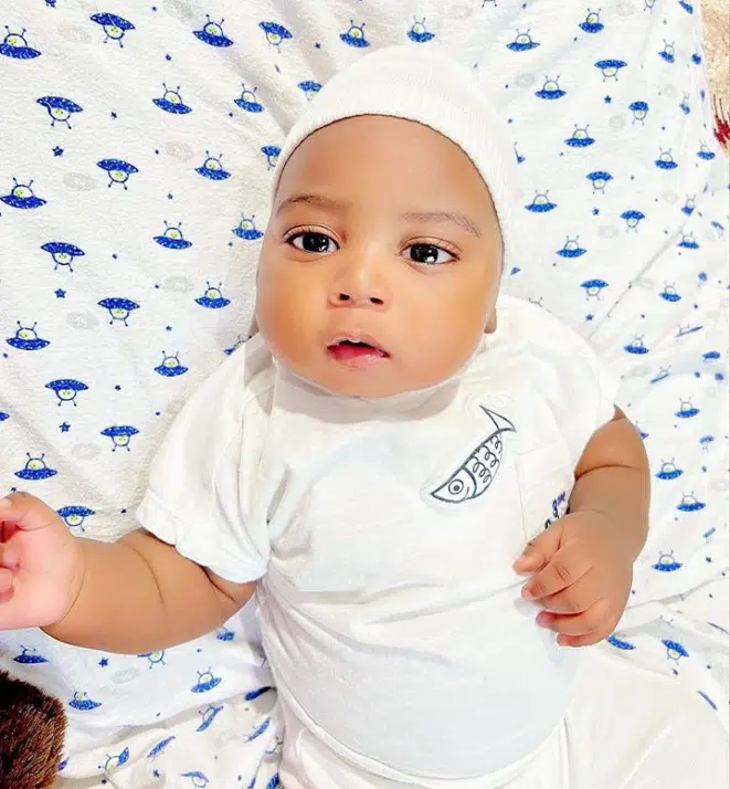 Regina Daniels teases son, Khalifa over chubby cheeks