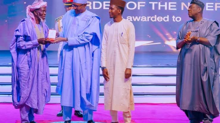 Buhari confers Islamic hero MFR award for hiding 262 Christians in Mosque during Plateau Attacks