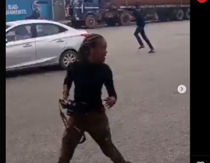 [TRENDING VIDEO] #EndSARS: Watch young camerawoman running for her dear life as police open fire @Lekki tollgate