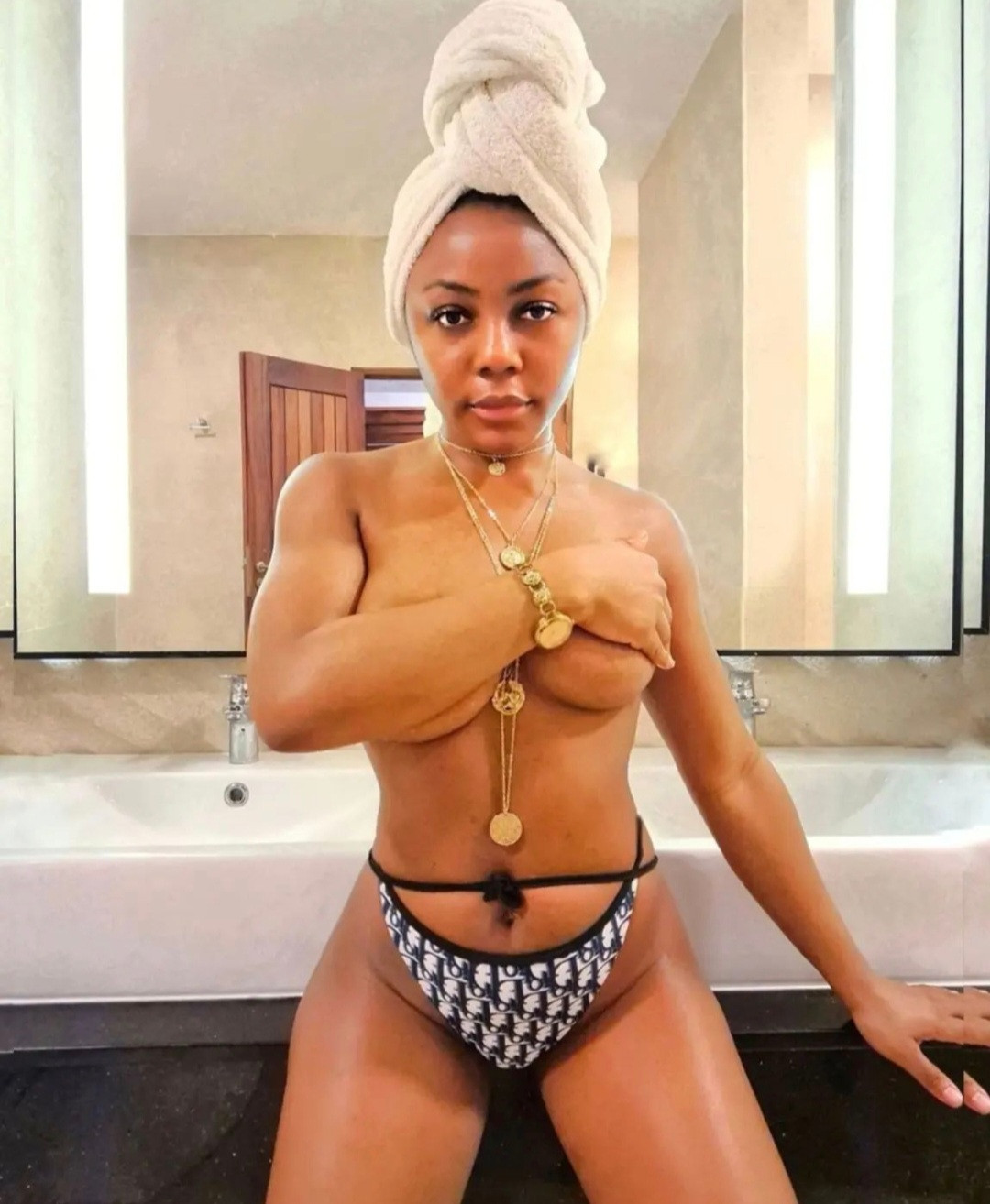 BBNaija star,  Ifuennada shares half nude in sultry new photos