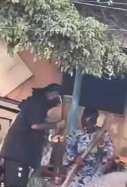 Burna Boy pounds yam on the street, netizens react