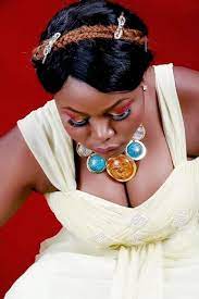  Modelling career began at the early age of 13 when she met Alek Wek and Kate Moss just after being signed by the London Fashion Week agency.[5] In 2005, she participated in the Nokia Face of Africa Competition[4] and since then, she has been very active in the international modelling scene. Aside featuring in the London Fashion Week, Adeola has also featured in other fashion weeks. Notable among them are the Johannesburg Fashion Week, Mozambique Fashion Week, Cape Town Fashion Week, Arise Fashion Week Lagos and the London Fashion Week.[5] She spent several years modelling in South Africa before securing the Elizabeth Arden appointment in February 2014.[6] Aside featuring in different fashion weeks, Adeola also featured for a number of fashion publications such as Marie Claire, True Love and Fair Lady, Cosmopolitan and Glamour.