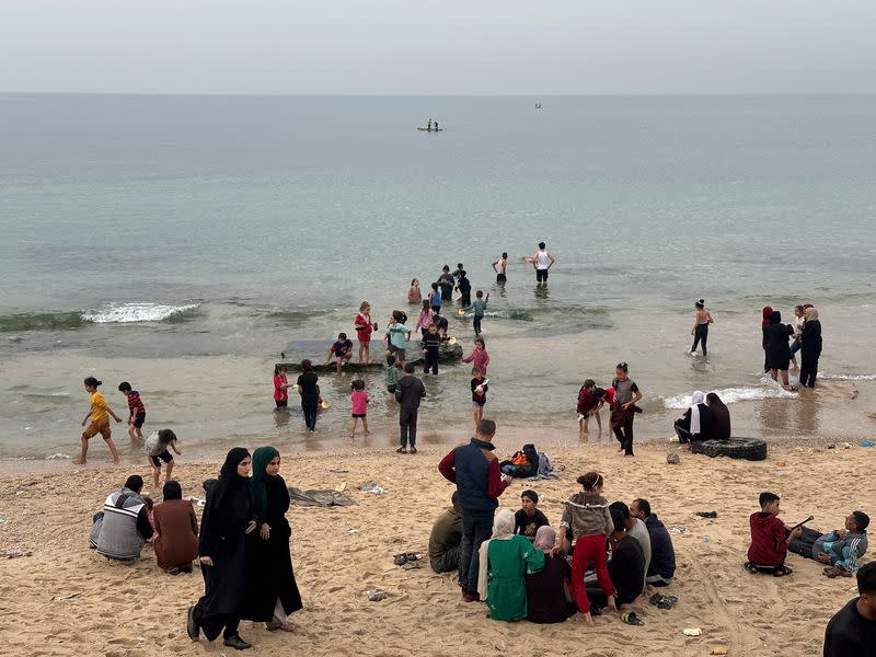 Tears, laughter on Gaza beach as children get break from war