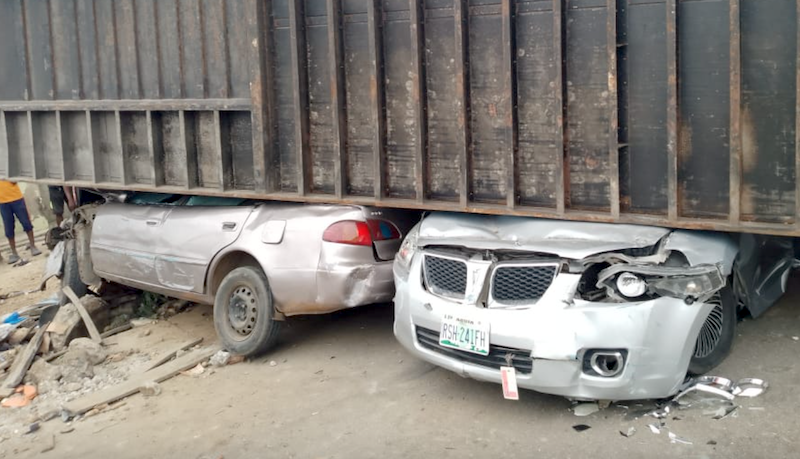 8 children cheat death as truck falls on 2 cars in Kogi