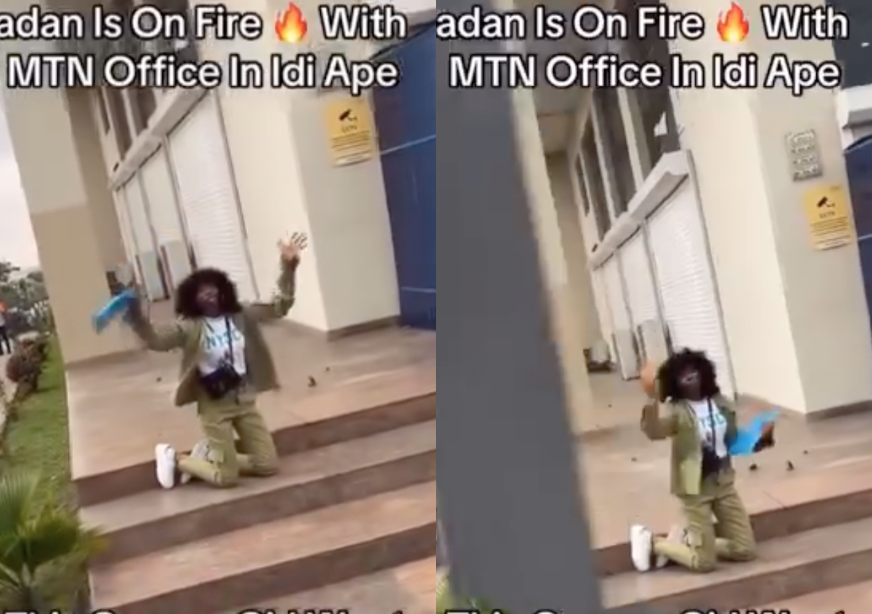 Watch brave NYSC member put her life on the line as angry costumers attempt to vandalize Mtn office in Ibadan