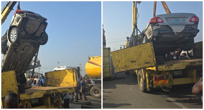 NARROW escape: Driver rescued as 40ft container falls on car in Lagos