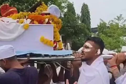 Sole survivor of Air India  crash is seen carrying his brother’s coffin as burial holds